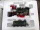 Image #3 of auction lot #1042: Collection of Thomas Kincaid Christmas train cars, track and power sup...
