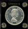 Image #2 of auction lot #1014: Canada 1953 shoulder strap proof like silver dollar in a Capital holde...