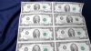 Image #1 of auction lot #1033: United States 1976 uncut sheet of sixteen two-dollar bills in a tube. ...
