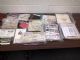 Image #1 of auction lot #127: Mostly foreign stamps in plastic bags with some album pages and a sele...