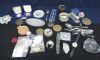 Image #1 of auction lot #49: Small but heavy box of travel souvenirs.  Mainly metal.  Lots of token...
