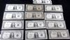 Image #1 of auction lot #1042: United States fourteen one-dollar 1935/1957 silver certificates in unc...