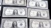 Image #3 of auction lot #1042: United States fourteen one-dollar 1935/1957 silver certificates in unc...