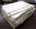 Image #1 of auction lot #1062: A stock of uncounted sheets starting in late 1930's and running to the...