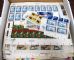 Image #3 of auction lot #1057: A mess of postage housed in sheet file folders, glassines and loose. I...