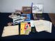 Image #1 of auction lot #1057: Lot of railroad related ephemera, a TP&W Side track plan book, buttons...