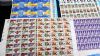 Image #2 of auction lot #1051: United States postage assortment in three cartons. Approximately $3,85...
